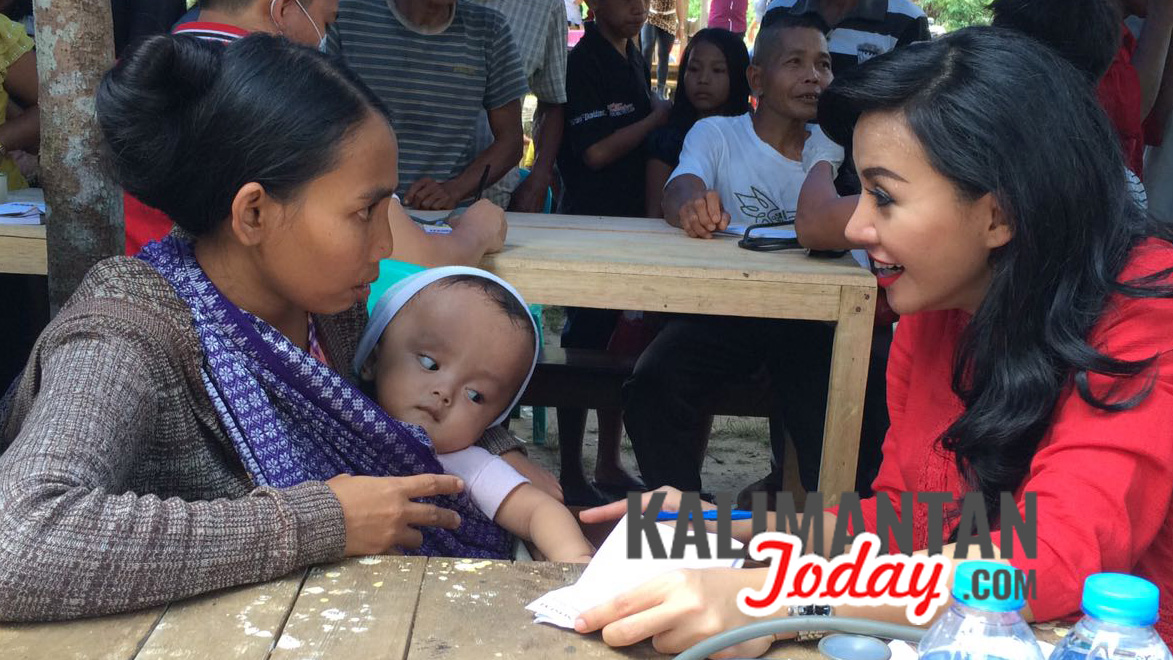 Wiwin (33) warga Dusun Reo Majo, Desa Amboyo Utara, Kecamatan Ngabang, Kabupaten Landak FOTO/Martin